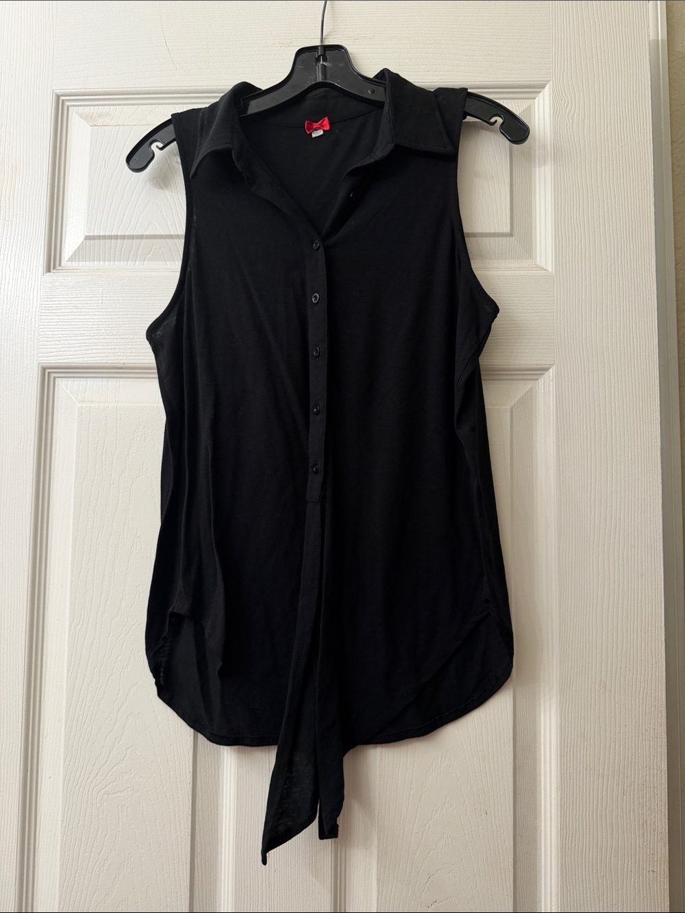 Sleeveless Black Button-Front Tie-Hem Top